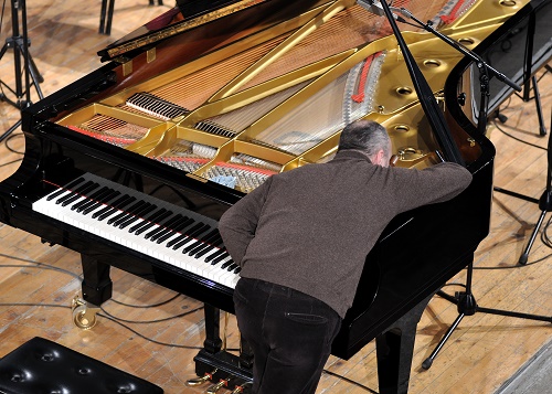 Here Walter Tunes a Piano