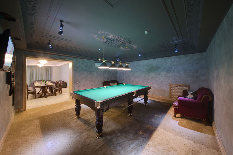 A fully restored pool table in a beautiful home 